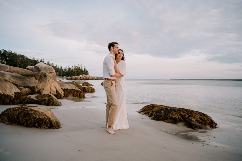 Sunset engagement session on the beach near Bull Point Estates. Photographed by Nova Scotia Wedding Photographer.