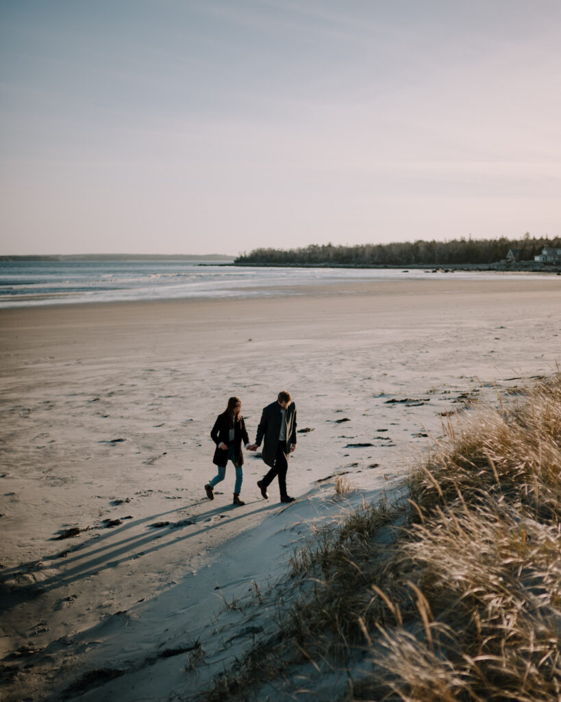 Couple walking on Nova Scotian Beach