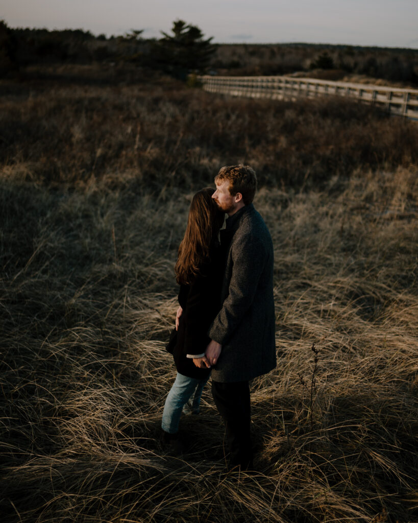 Couple hugging on Nova Scotian Beach