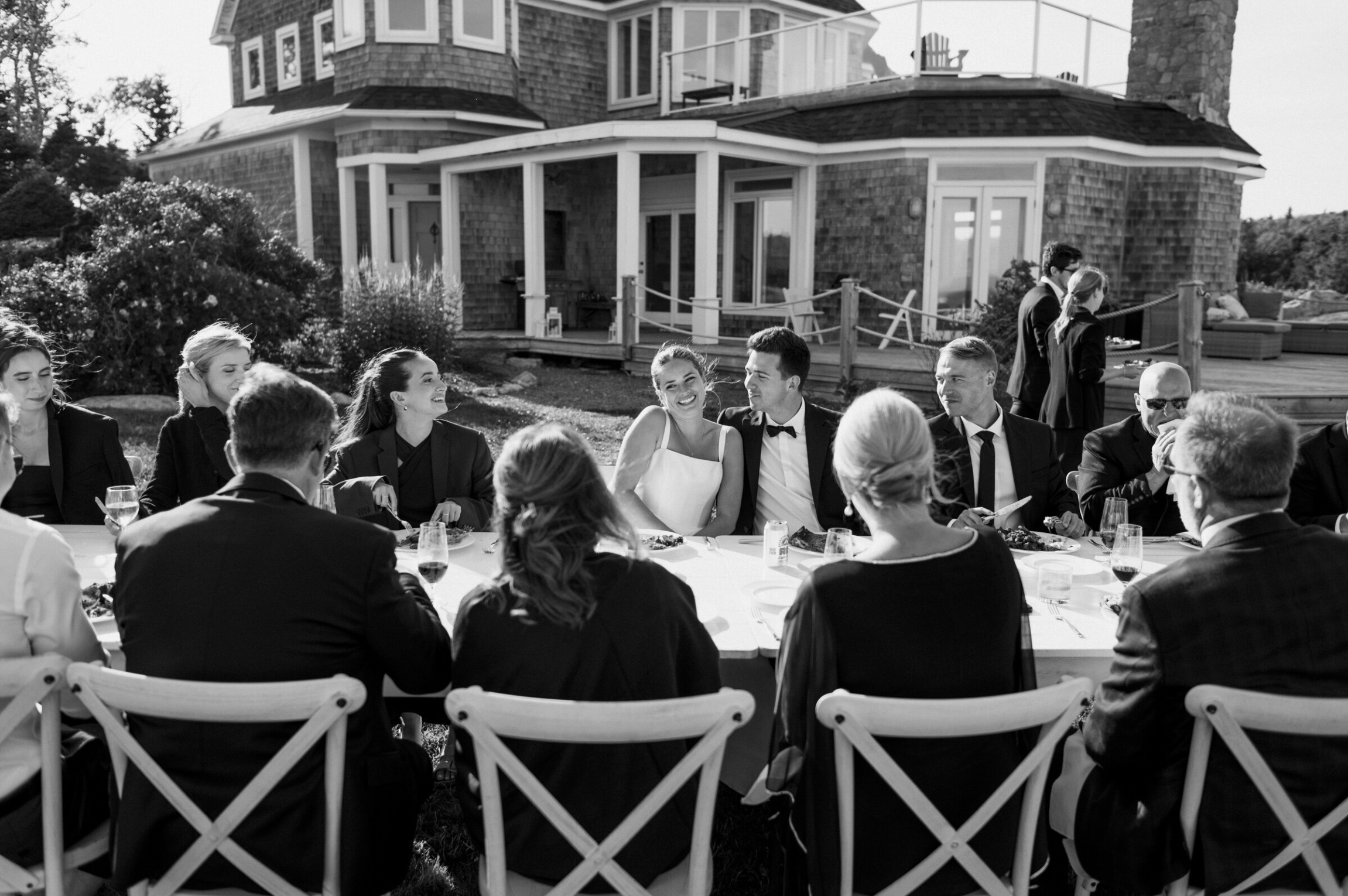 Guests at outdoor wedding at Bull Point Estate in Nova Scotia.